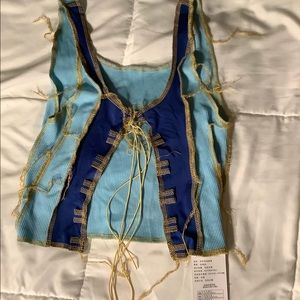 Nice, New and very cute and colorful lace up top size small.